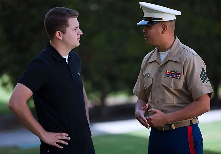 Marine speaking to pedestrian